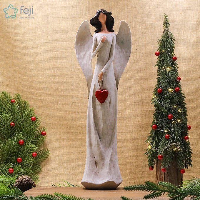 Angel Figurine Holding Red Heart