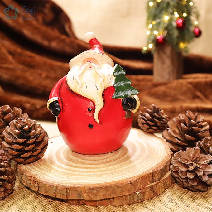 Santa with Tree Figurine